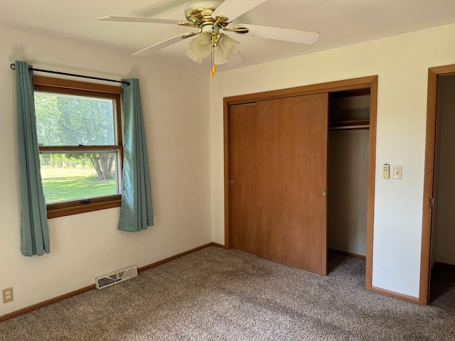 1536 Marberly Dr, Rockford, IL 61103 - unfurnished bedroom with carpet flooring, a closet, and ceiling fan