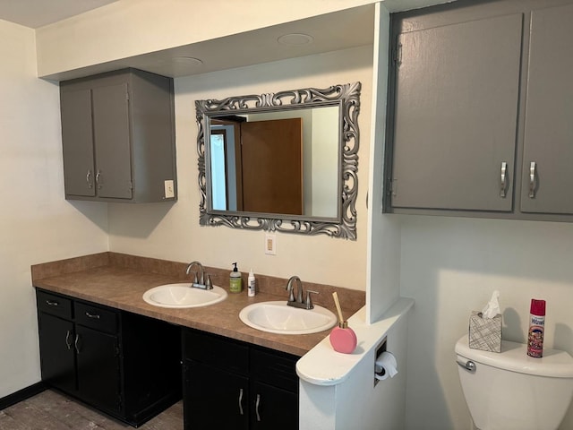 1536 Marberly Dr, Rockford, IL 61103 - bathroom featuring toilet and double vanity