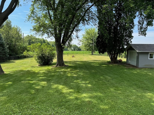 1536 Marberly Dr, Rockford, IL 61103 - view of yard featuring a detached garage and an outdoor structure