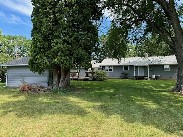 1536 Marberly Dr, Rockford, IL 61103 - view of green lawn with a deck