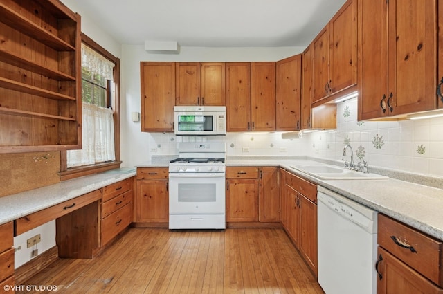3900 N Keeler Ave, Chicago, IL 60641 - kitchen featuring white appliances, brown cabinets, light countertops, and decorative backsplash