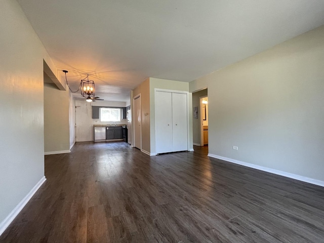 1208 Whispering Hills Ct Unit 1A, Naperville, IL 60540 - unfurnished living room with a chandelier and dark wood-style flooring