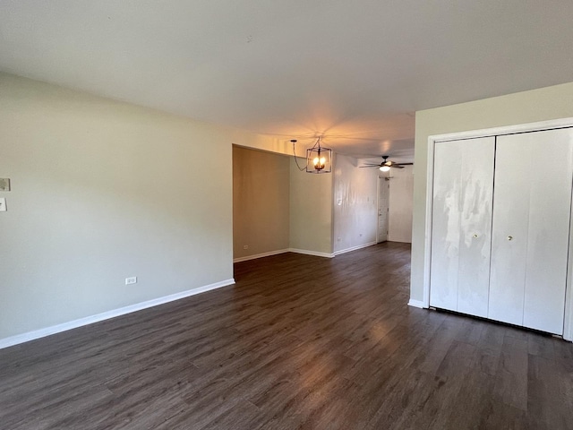 1208 Whispering Hills Ct Unit 1A, Naperville, IL 60540 - unfurnished living room with a chandelier, dark wood-style floors, and ceiling fan