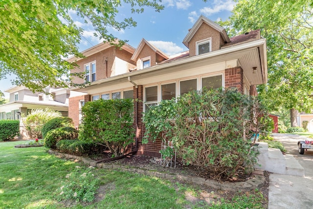 141 E Lincoln St, Seneca, IL 61360 - view of front of home featuring brick siding and a front yard