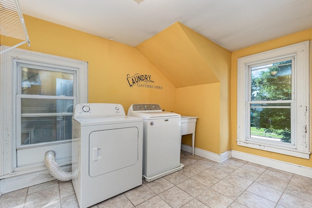 141 E Lincoln St, Seneca, IL 61360 - washroom with washer and clothes dryer and light tile patterned flooring