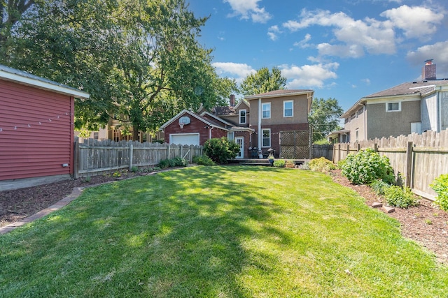 141 E Lincoln St, Seneca, IL 61360 - fenced backyard featuring a garage