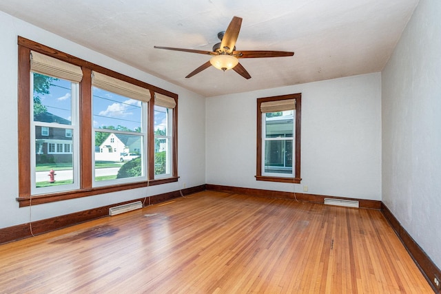 141 E Lincoln St, Seneca, IL 61360 - unfurnished room with hardwood / wood-style floors and ceiling fan