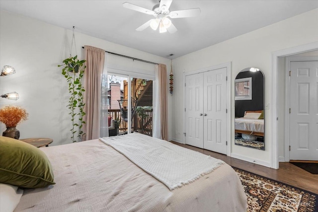 1124 W Diversey Pkwy Unit 2W, Chicago, IL 60614 - bedroom with arched walkways, access to outside, wood finished floors, a ceiling fan, and a closet