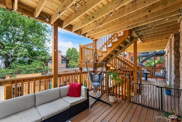 1124 W Diversey Pkwy Unit 2W, Chicago, IL 60614 - wooden deck featuring stairs and an outdoor hangout area