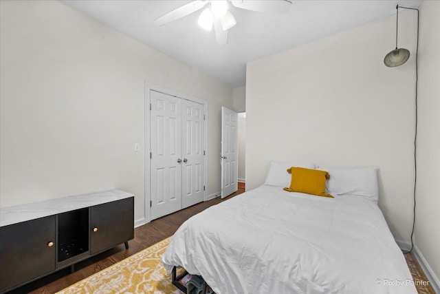 1124 W Diversey Pkwy Unit 2W, Chicago, IL 60614 - bedroom featuring dark wood-style floors, a ceiling fan, and a closet