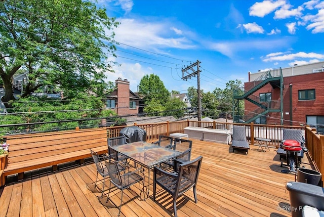 1124 W Diversey Pkwy Unit 2W, Chicago, IL 60614 - wooden terrace with outdoor dining space and grilling area