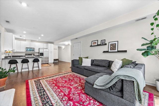 1124 W Diversey Pkwy Unit 2W, Chicago, IL 60614 - living area featuring wood finished floors and recessed lighting