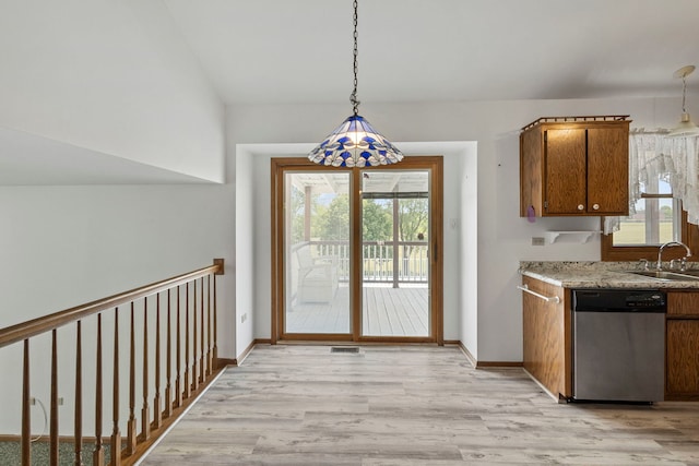 8425 Brookside Glen Dr, Tinley Park, IL 60487 - kitchen with dishwasher, brown cabinets, light wood finished floors, and pendant lighting