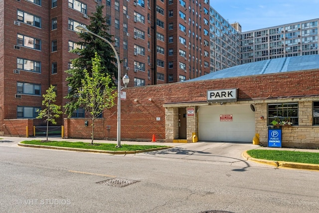2909 N Sheridan Rd Unit 1309, Chicago, IL 60657 - view of apartment building / complex with concrete driveway