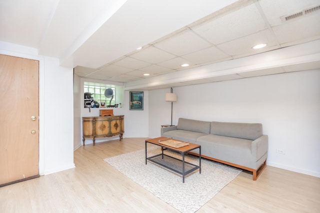 4805 S Langley Ave, Chicago, IL 60615 - living room with light wood-style flooring, a paneled ceiling, and recessed lighting