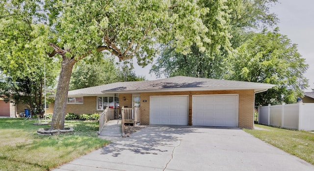 680 S Center Ave, Bradley, IL 60915 - ranch-style home featuring an attached garage, concrete driveway, and brick siding