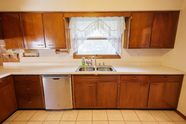 680 S Center Ave, Bradley, IL 60915 - kitchen with dishwasher, light countertops, light tile patterned floors, and brown cabinets