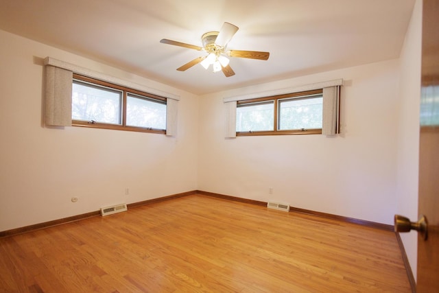 680 S Center Ave, Bradley, IL 60915 - unfurnished room with healthy amount of natural light, light wood-style flooring, and a ceiling fan