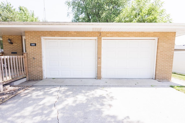 680 S Center Ave, Bradley, IL 60915 - garage with concrete driveway