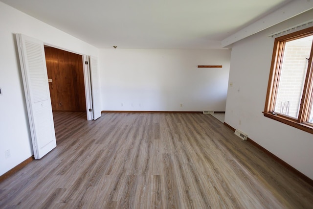 680 S Center Ave, Bradley, IL 60915 - spare room featuring light wood-type flooring and baseboards