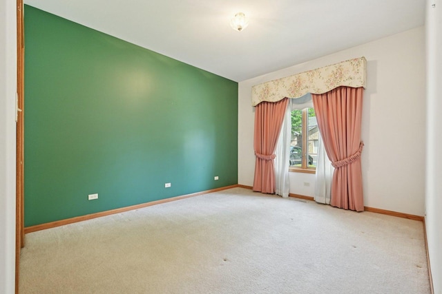 757 Bauman St Unit 0, Marengo, IL 60152 - unfurnished room featuring carpet flooring and baseboards