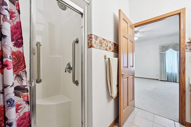 757 Bauman St Unit 0, Marengo, IL 60152 - bathroom featuring a stall shower, tile patterned flooring, and ceiling fan
