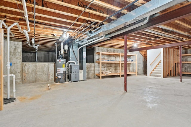 757 Bauman St Unit 0, Marengo, IL 60152 - unfinished basement with water heater, heating unit, and stairway