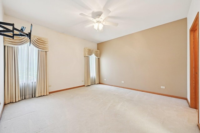 757 Bauman St Unit 0, Marengo, IL 60152 - empty room featuring ceiling fan and light carpet