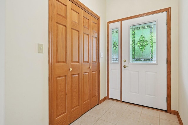 757 Bauman St Unit 0, Marengo, IL 60152 - entryway with baseboards and light tile patterned floors