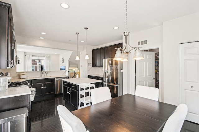 2903 Henley Ln, Naperville, IL 60540 - dining area with recessed lighting and dark wood-style flooring