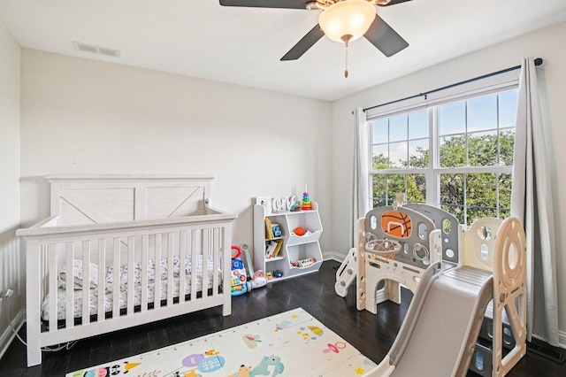 2903 Henley Ln, Naperville, IL 60540 - bedroom featuring wood finished floors, ceiling fan, and a nursery area