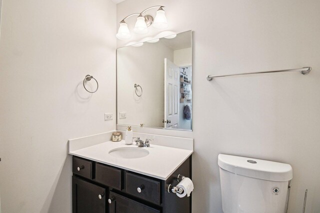 2903 Henley Ln, Naperville, IL 60540 - half bathroom featuring vanity and toilet