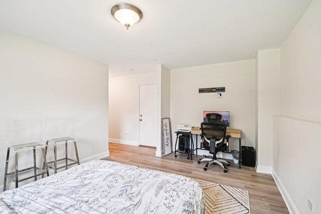 2903 Henley Ln, Naperville, IL 60540 - bedroom featuring wood finished floors and an office area
