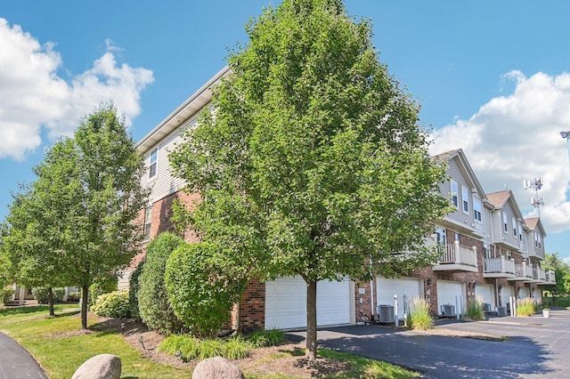 2903 Henley Ln, Naperville, IL 60540 - view of front facade featuring brick siding and an attached garage
