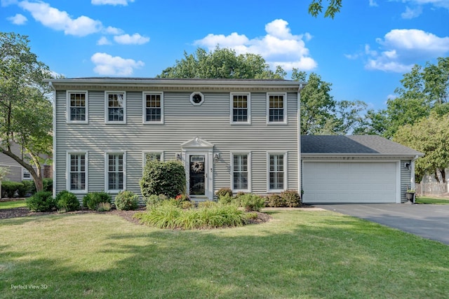 985 W Bauer Rd, Naperville, IL 60563 - colonial inspired home with asphalt driveway, an attached garage, and a front lawn