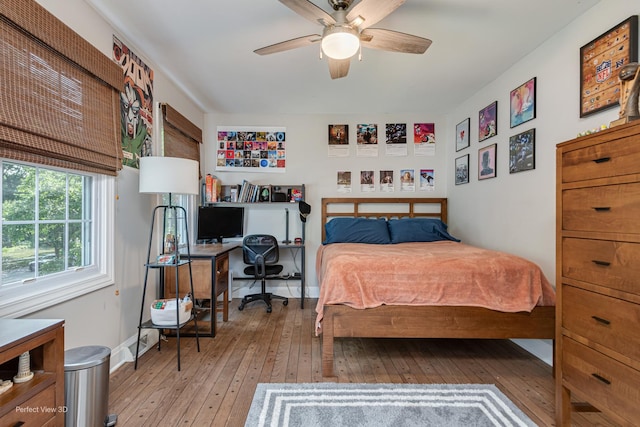 985 W Bauer Rd, Naperville, IL 60563 - bedroom featuring hardwood / wood-style flooring, a desk, and a ceiling fan