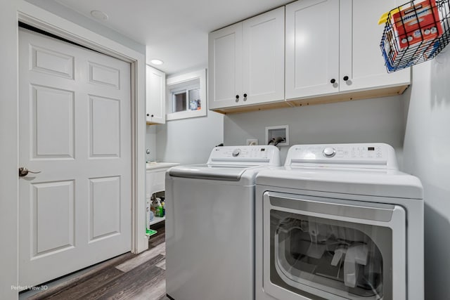 985 W Bauer Rd, Naperville, IL 60563 - washroom featuring cabinet space, washing machine and dryer, dark wood-style flooring, and recessed lighting