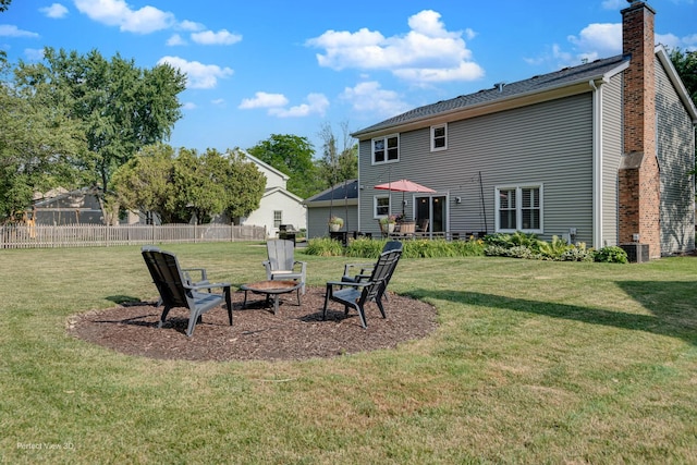 985 W Bauer Rd, Naperville, IL 60563 - rear view of house with a chimney and an outdoor fire pit