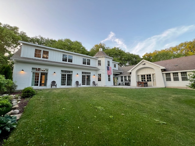 204 Country Commons Rd, Trout Valley, IL 60013 - back of house with a patio area, a yard, a chimney, and board and batten siding
