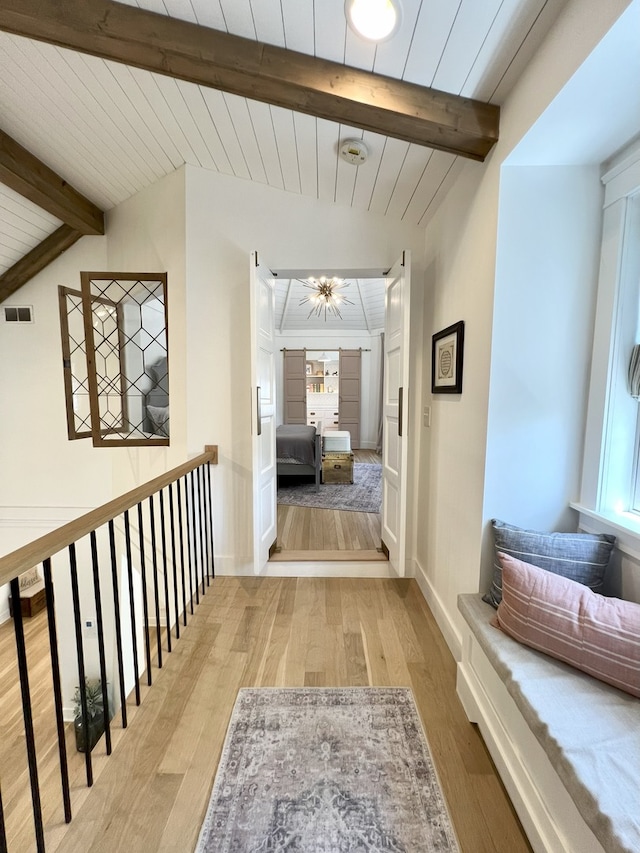 204 Country Commons Rd, Trout Valley, IL 60013 - corridor featuring beamed ceiling, light wood-type flooring, and healthy amount of natural light