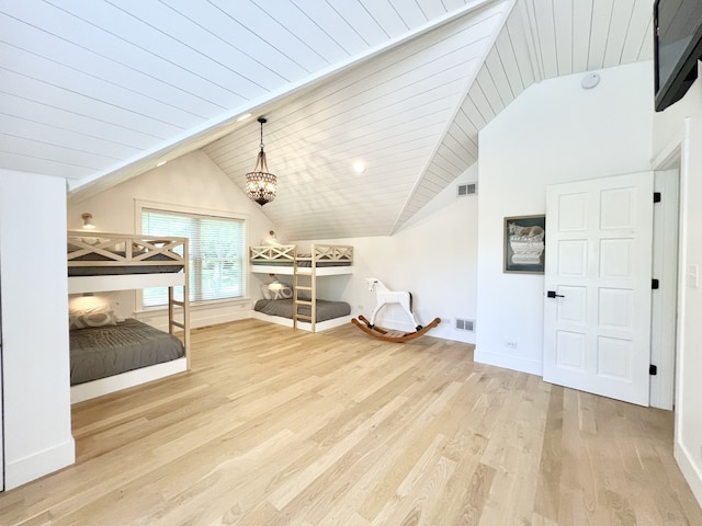 204 Country Commons Rd, Trout Valley, IL 60013 - additional living space with vaulted ceiling, light wood-style flooring, and a chandelier