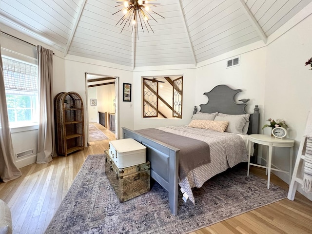 204 Country Commons Rd, Trout Valley, IL 60013 - bedroom with light wood-style flooring, a wooden ceiling with exposed beams, a chandelier, high vaulted ceiling, and ensuite bathroom
