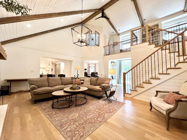 204 Country Commons Rd, Trout Valley, IL 60013 - living room with high vaulted ceiling, wood finished floors, stairway, a wood ceiling with exposed beams, and a chandelier