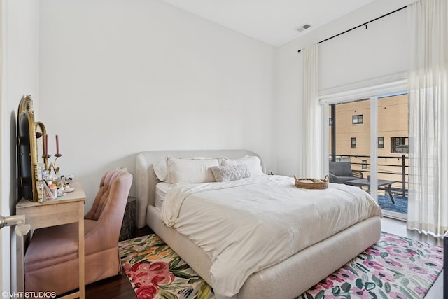 2549 N Southport Ave Unit 3, Chicago, IL 60614 - bedroom featuring access to exterior, wood finished floors, and multiple windows