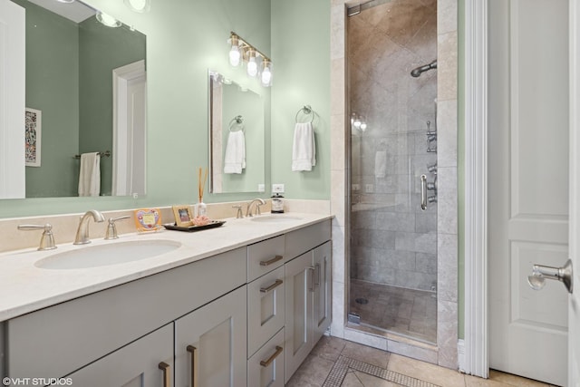 2549 N Southport Ave Unit 3, Chicago, IL 60614 - bathroom with a shower stall, double vanity, and tile patterned flooring