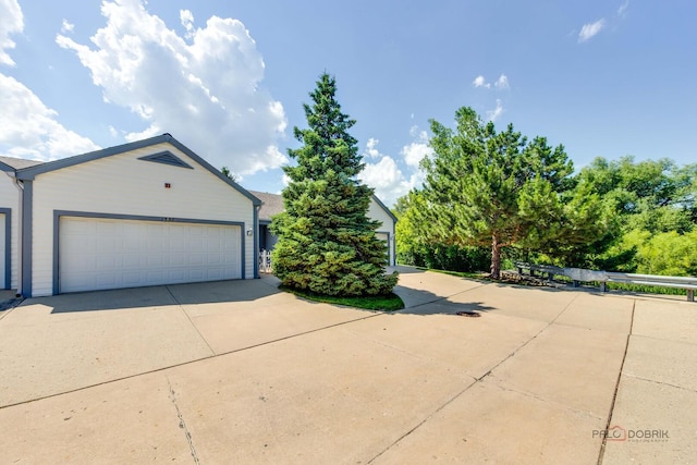 1538 Queen Ann Ln, Gurnee, IL 60031 - view of home's exterior featuring a garage and concrete driveway