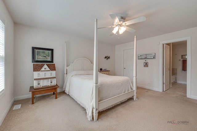 1538 Queen Ann Ln, Gurnee, IL 60031 - bedroom with light carpet, multiple windows, a ceiling fan, and ensuite bath