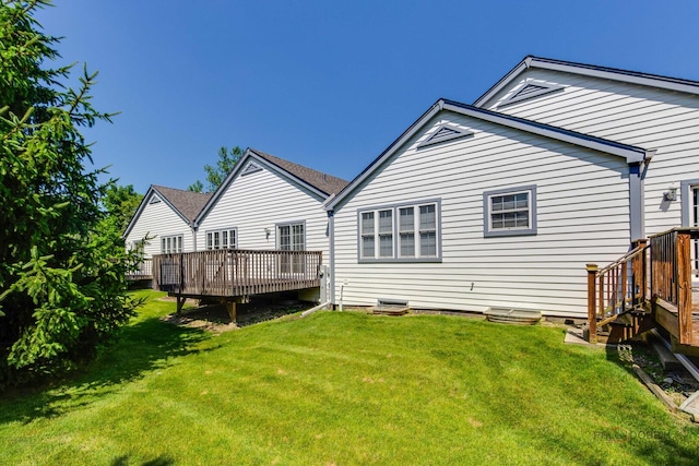 1538 Queen Ann Ln, Gurnee, IL 60031 - back of property with a wooden deck and a yard
