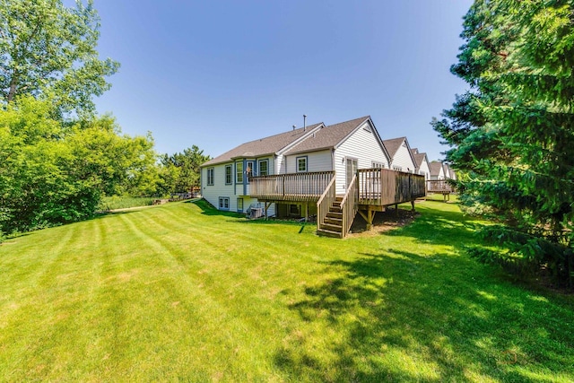 1538 Queen Ann Ln, Gurnee, IL 60031 - rear view of property with a deck and a lawn
