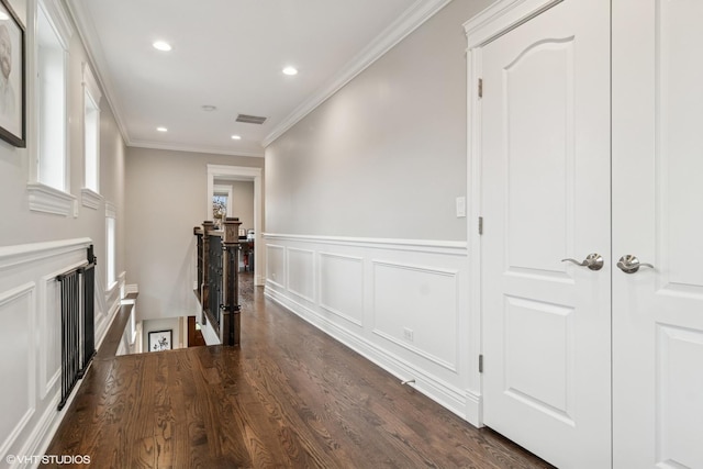 4130 N Mango Ave, Chicago, IL 60634 - hall with an upstairs landing, crown molding, a wainscoted wall, recessed lighting, and a decorative wall